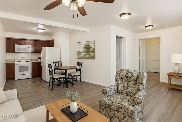 603 S Colcord Rd, Payson, AZ 85541 - living room featuring baseboards, a ceiling fan, and light wood-style flooring
