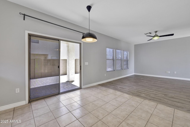 1090 S Bogle Ct, Chandler, AZ 85286 - tiled empty room with ceiling fan and healthy amount of natural light
