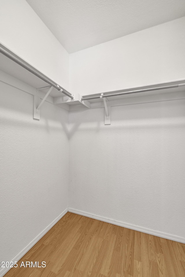 1090 S Bogle Ct, Chandler, AZ 85286 - walk in closet featuring light wood finished floors