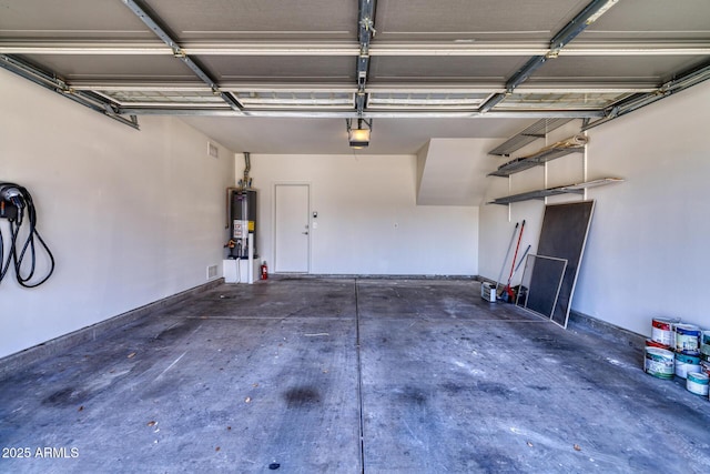 1090 S Bogle Ct, Chandler, AZ 85286 - garage with a garage door opener and water heater