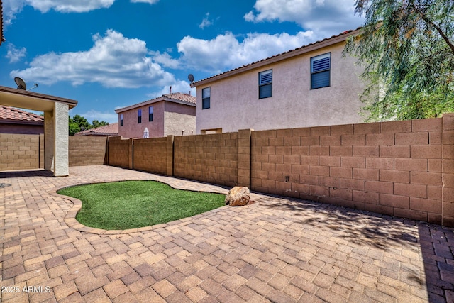 1090 S Bogle Ct, Chandler, AZ 85286 - fenced backyard with a patio