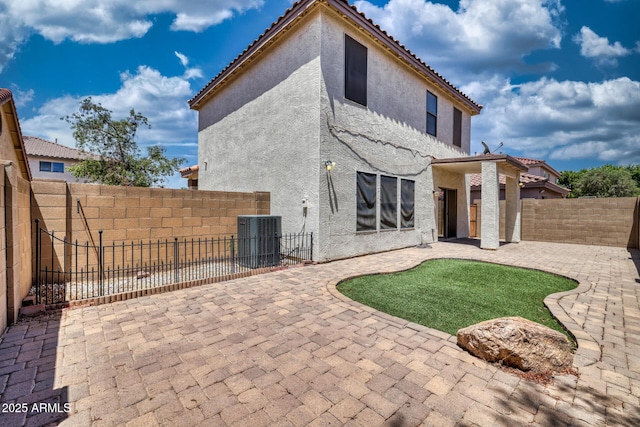 1090 S Bogle Ct, Chandler, AZ 85286 - rear view of house featuring a patio area, stucco siding, and a fenced backyard