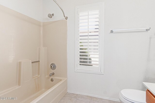 full bathroom featuring tile patterned floors, vanity, bathtub / shower combination, and toilet