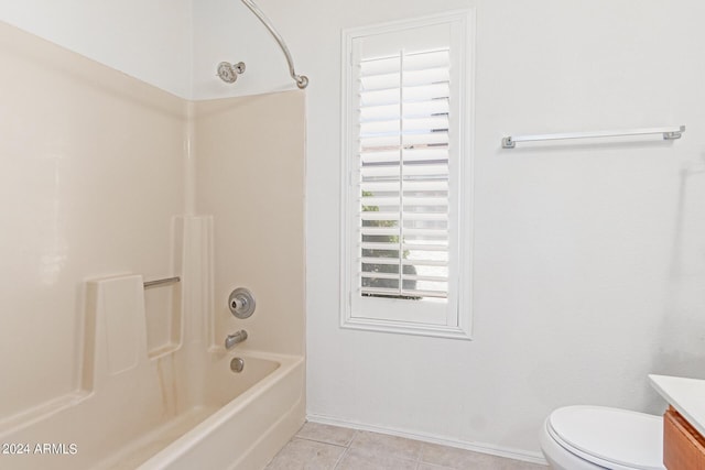 4760 W Wahalla Ln, Glendale, AZ 85308 - full bathroom featuring vanity, toilet, tile patterned flooring, washtub / shower combination, and baseboards