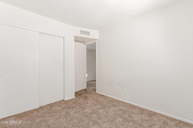 4760 W Wahalla Ln, Glendale, AZ 85308 - unfurnished bedroom with light colored carpet and a closet