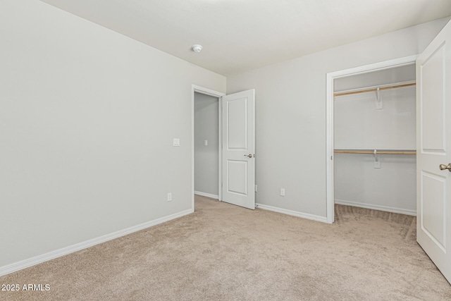 2000 N 36th St Unit 17, Phoenix, AZ 85008 - unfurnished bedroom featuring carpet flooring, a spacious closet, and a closet