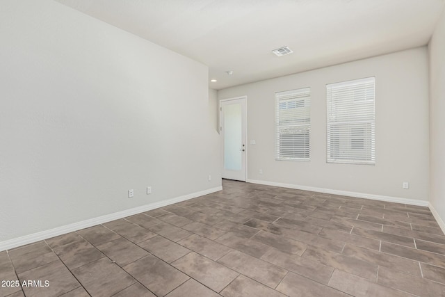 2000 N 36th St Unit 17, Phoenix, AZ 85008 - empty room featuring baseboards and recessed lighting