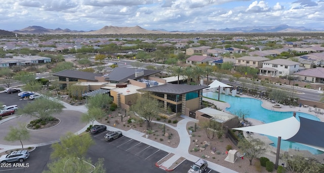 birds eye view of property featuring a residential view and a mountain view