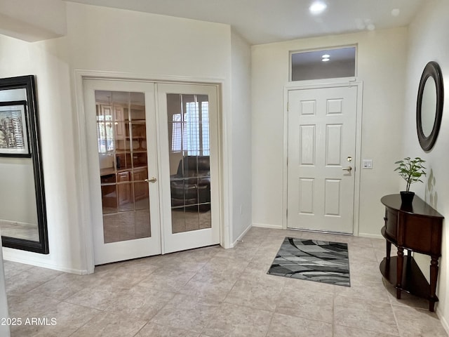 entryway featuring french doors