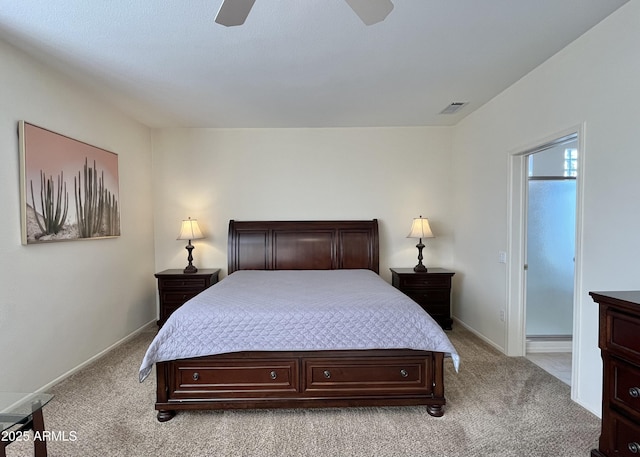 bedroom with a baseboard heating unit, light colored carpet, and ceiling fan