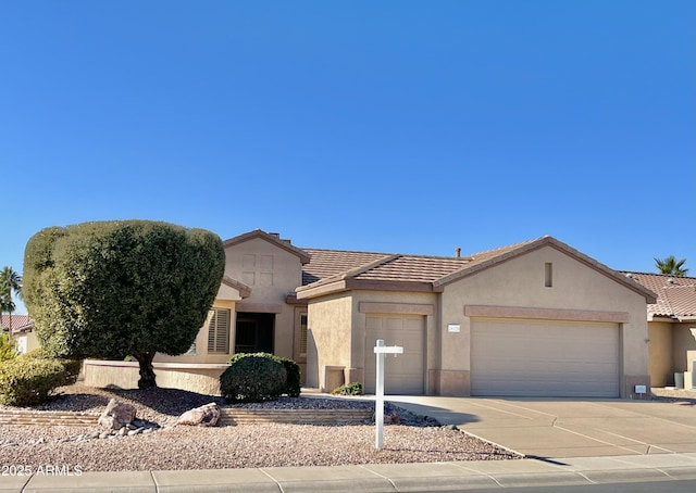 view of front of property with a garage