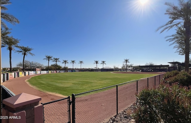 view of property's community featuring a lawn