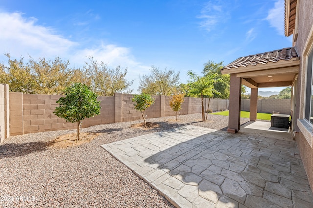 view of patio with central AC unit