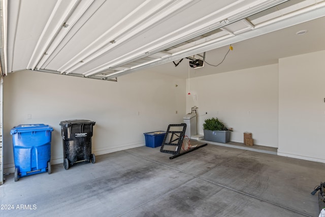 garage featuring a garage door opener