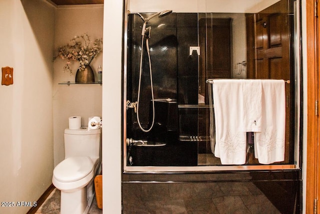 bathroom featuring toilet and walk in shower