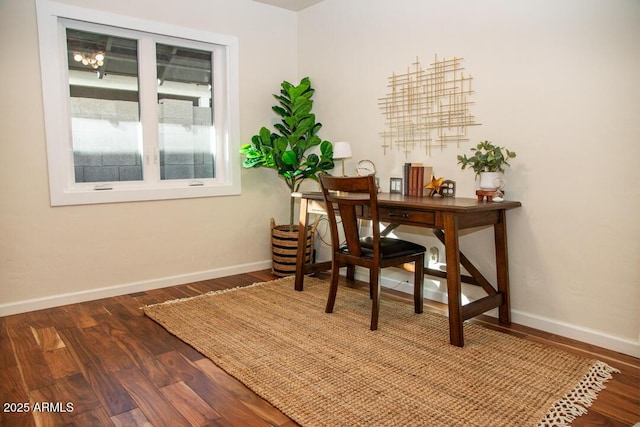 office space with dark hardwood / wood-style floors