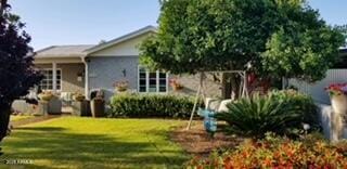 view of front of home featuring a front lawn