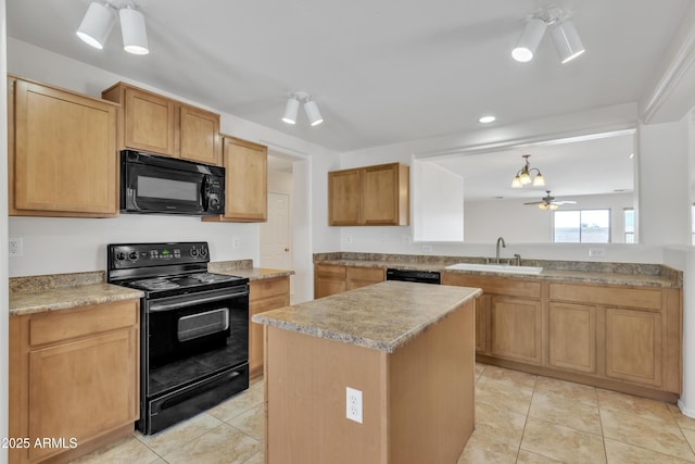 kitchen with ceiling fan, black appliances, a center island, light tile patterned flooring, and a sink