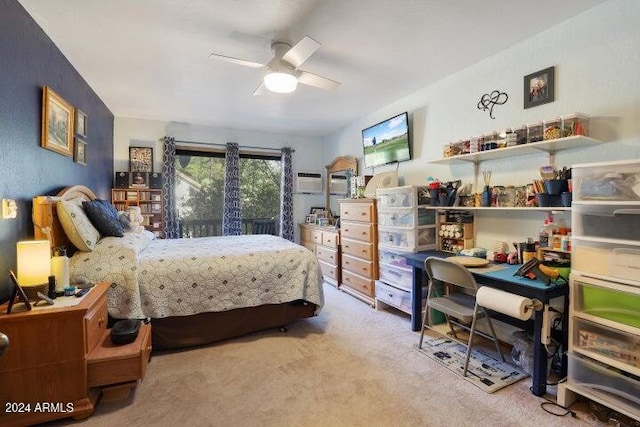 bedroom featuring light carpet and ceiling fan