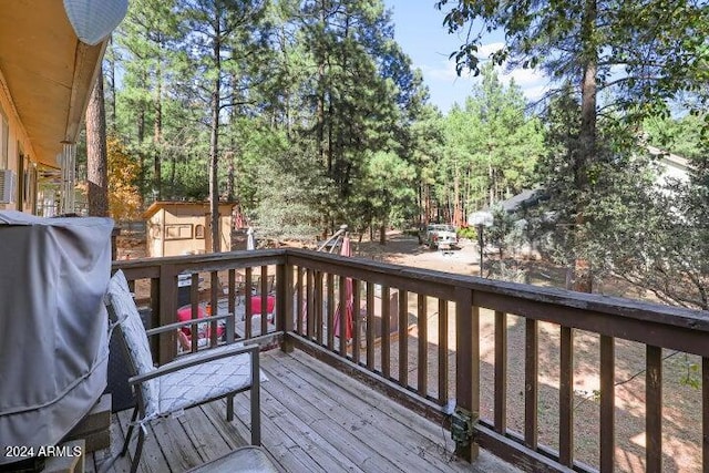deck featuring a storage unit