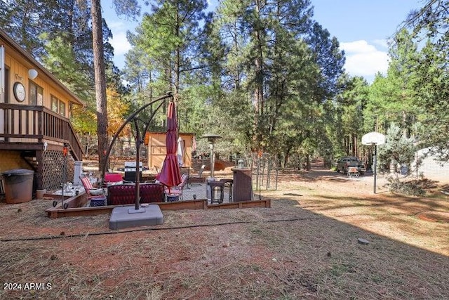 view of yard with a deck