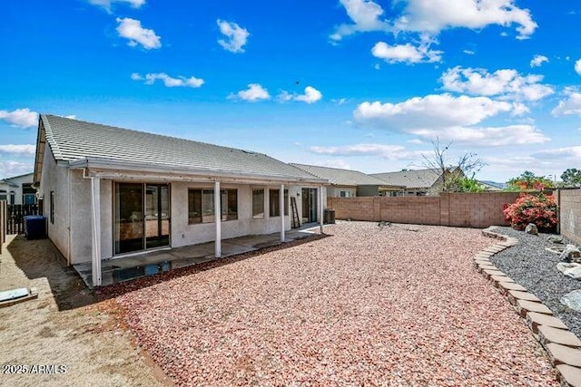 back of house featuring a patio area