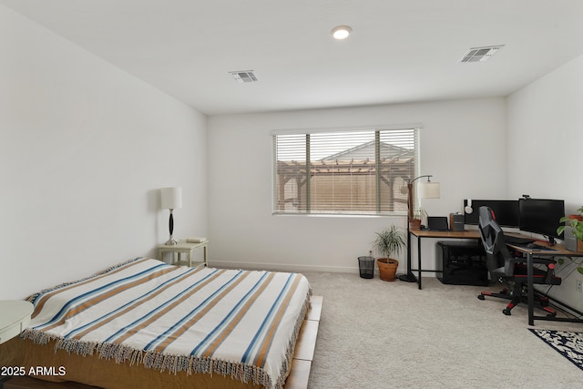 bedroom featuring baseboards, visible vents, and carpet floors
