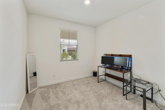 carpeted office with baseboards
