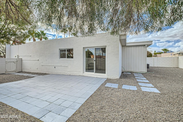 rear view of house featuring a patio area