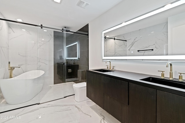 full bathroom featuring toilet, vanity, and shower with separate bathtub