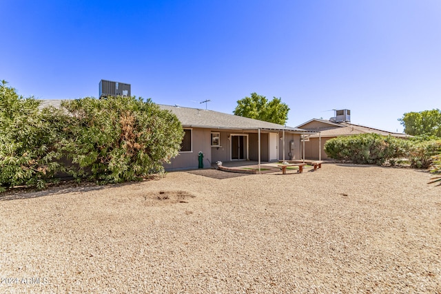 rear view of property with a patio