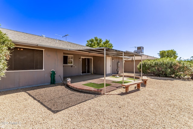 rear view of house with a patio area