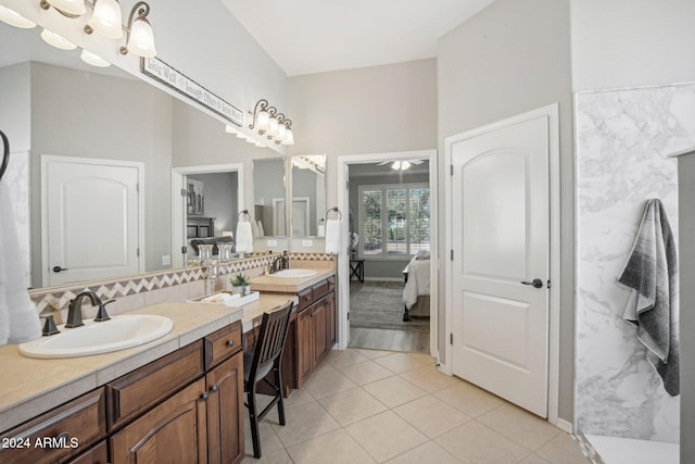 bathroom with vanity, ceiling fan, and tile patterned floors