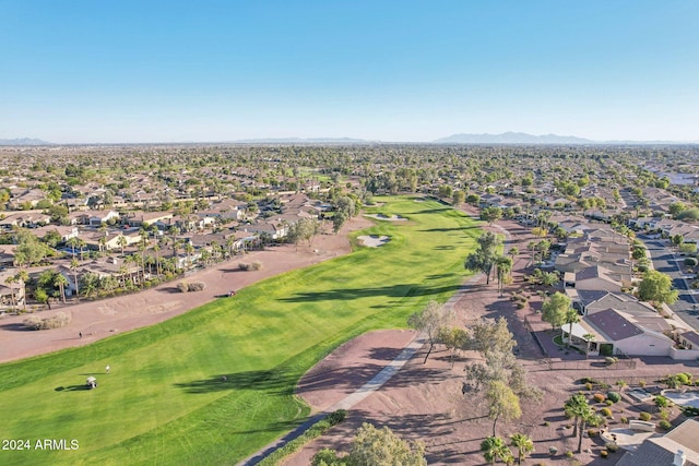 birds eye view of property featuring a mountain view