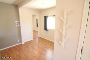 corridor featuring hardwood / wood-style flooring