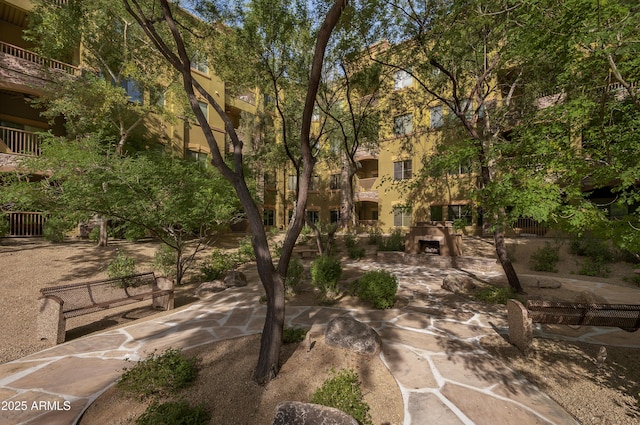 surrounding community featuring a patio