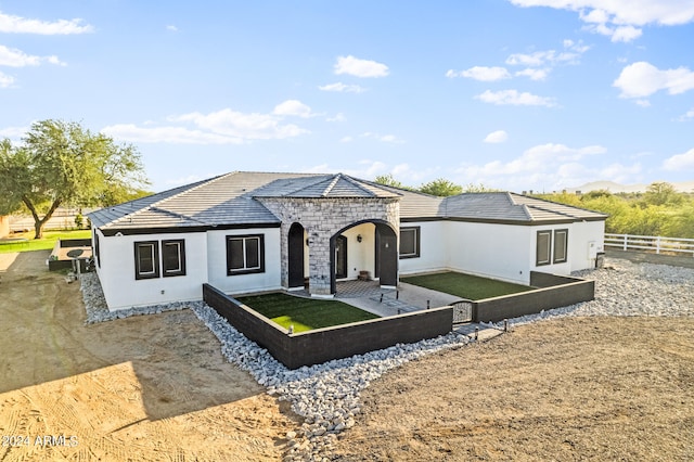 view of front of property with a patio