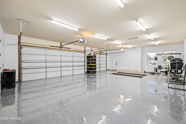 17617 W Rose Ln, Waddell, AZ 85355 - garage featuring a garage door opener