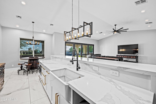 17617 W Rose Ln, Waddell, AZ 85355 - kitchen featuring visible vents, french doors, and recessed lighting