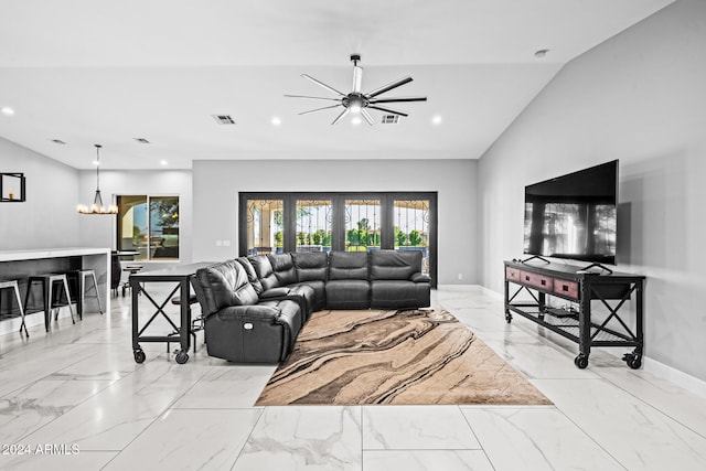 17617 W Rose Ln, Waddell, AZ 85355 - living room featuring recessed lighting, marble finish floor, visible vents, and vaulted ceiling