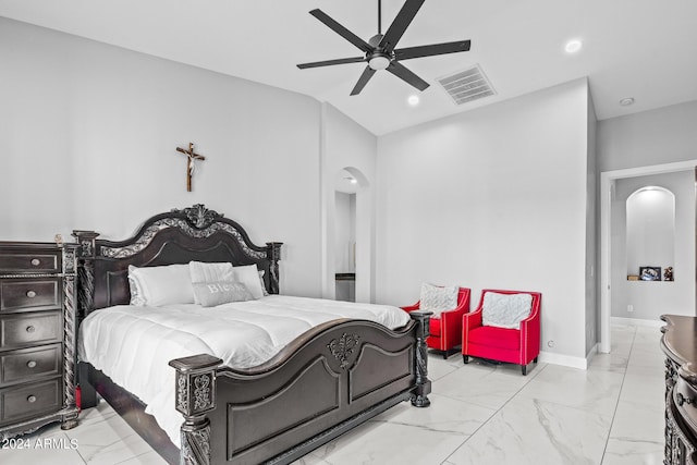 17617 W Rose Ln, Waddell, AZ 85355 - bedroom featuring a ceiling fan, marble finish floor, visible vents, vaulted ceiling, and baseboards