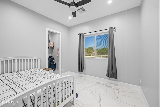 bedroom with a closet and ceiling fan