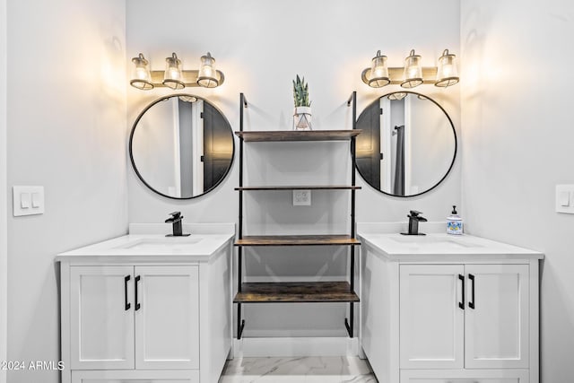 17617 W Rose Ln, Waddell, AZ 85355 - bathroom with two vanities, marble finish floor, and a sink