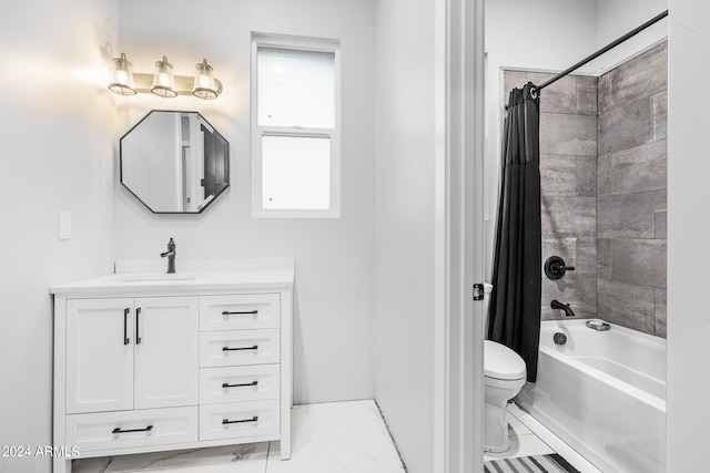 full bathroom with shower / bath combo, vanity, and toilet