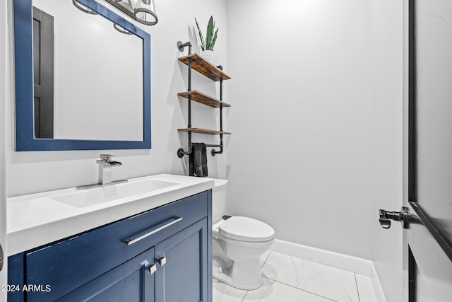 17617 W Rose Ln, Waddell, AZ 85355 - half bath featuring baseboards, toilet, vanity, and marble finish floor