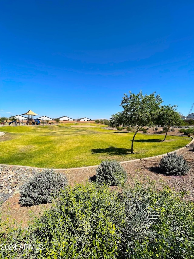 view of property's community with a gazebo and a lawn