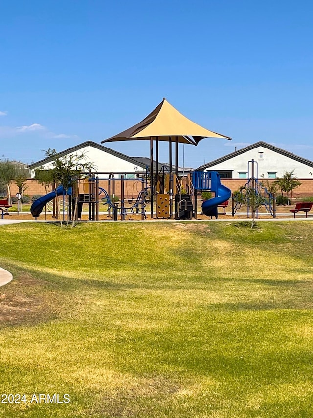 view of jungle gym featuring a yard