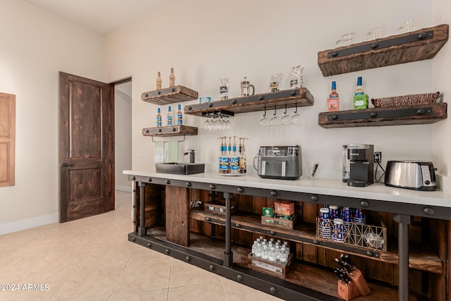 bar with light tile patterned floors