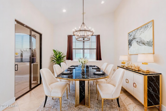 dining space with a notable chandelier