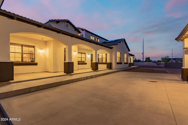 view of front of house with a patio area